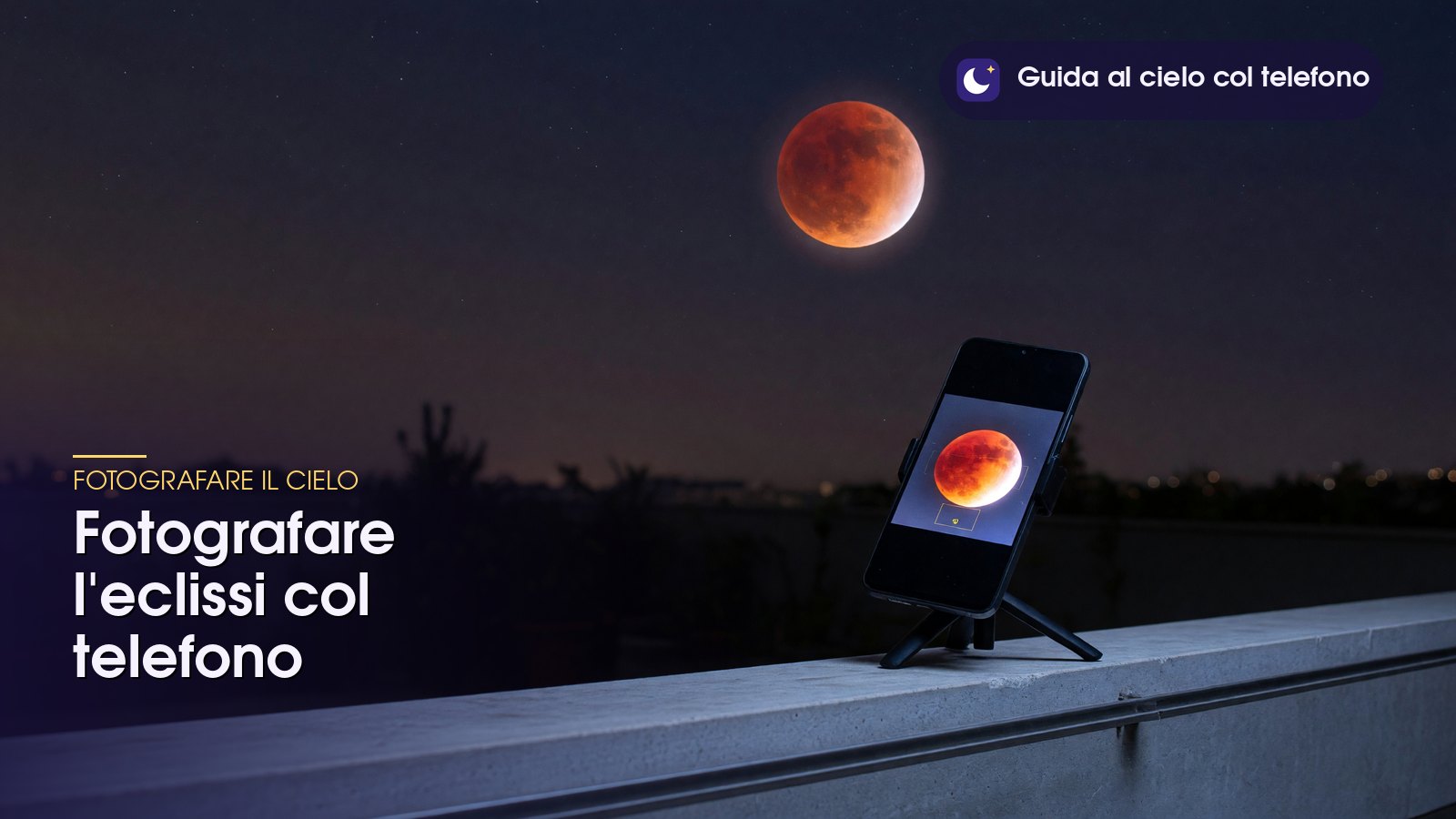 Telefono su treppiede che riprende la Luna rossa, per fotografare l'eclissi col telefono